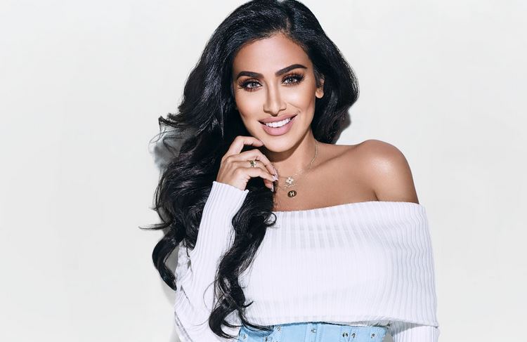 Huda Kattan height